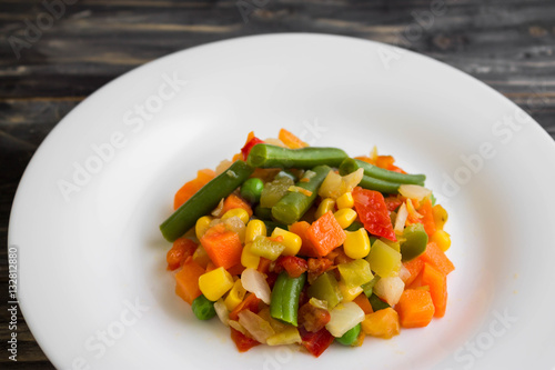 Vegetable salad on a white plate. Dietary dish.