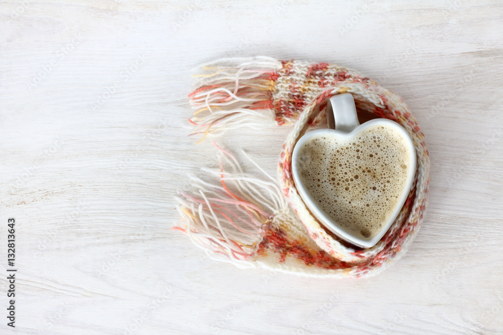 aspiration good feelings/
heart symbol in the form of a cup of coffee with foam wrapped in a warming scarf
aspiration good feelings/
heart symbol in the form of a cup of coffee with foam wrapped in a warming scarf