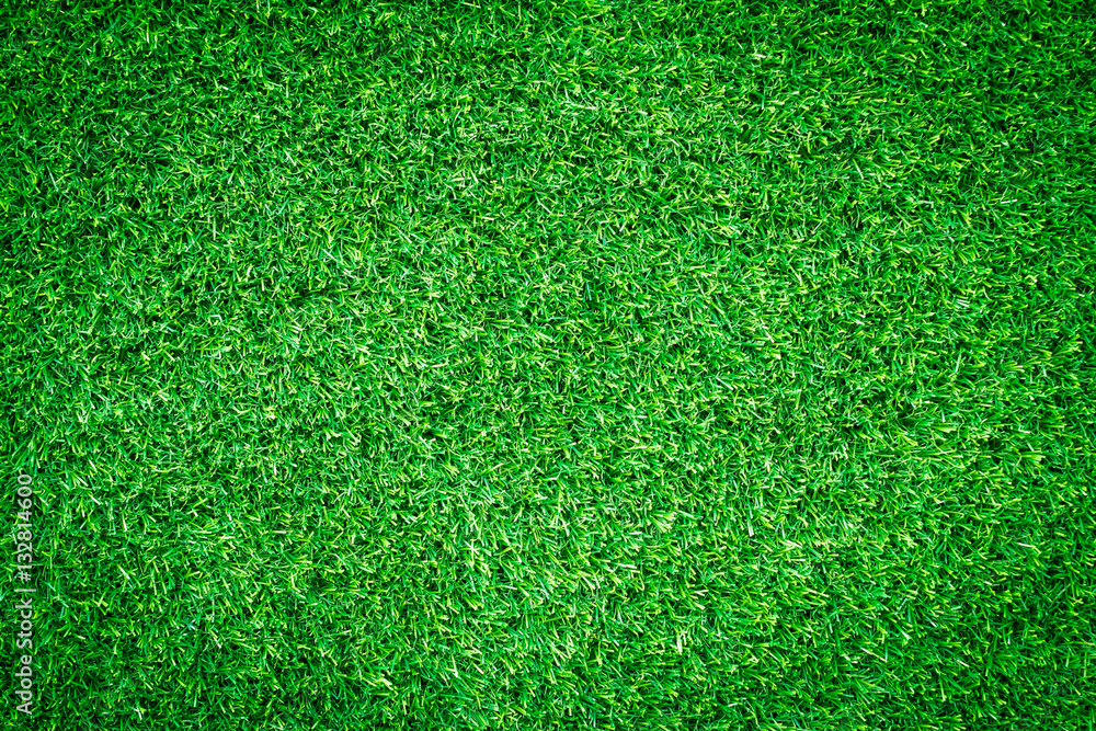Fototapeta premium Green grass texture, grass background for design with copy space for text or image. Top view of artificial green grass for golf course and soccer field.