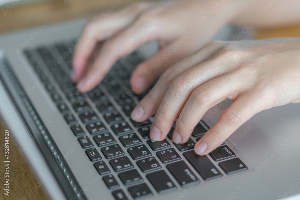 Closeup of business woman hand typing on laptop keyboard . Closeup of business woman hand typing on laptop keyboard .