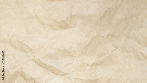 Recycled crumpled brown paper texture, paper background for design with copy space for text or image.