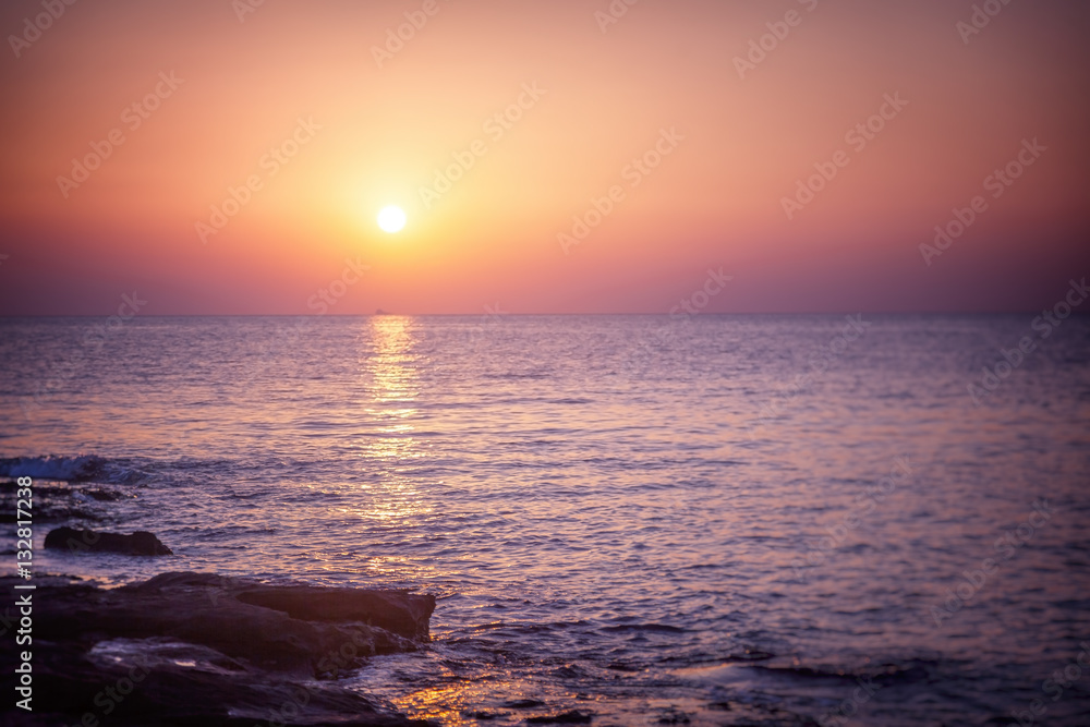 Scenery of beach during twilight with magenta color