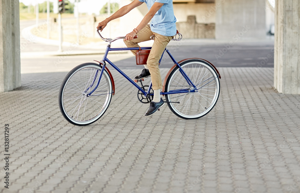 Fototapeta premium hipster man riding fixed gear bike