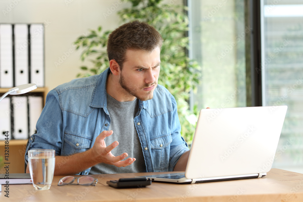 Angry freelance with a laptop Angry freelance with a laptop