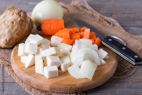 Slika na platnu Diced vegetables on a cutting board