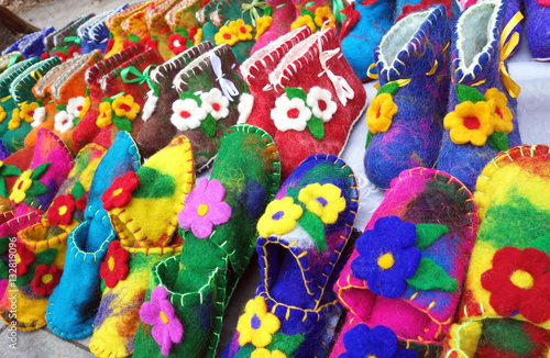 Handmade colorful wool slippers or shoes for sale at street in Tbilisi  Georgia