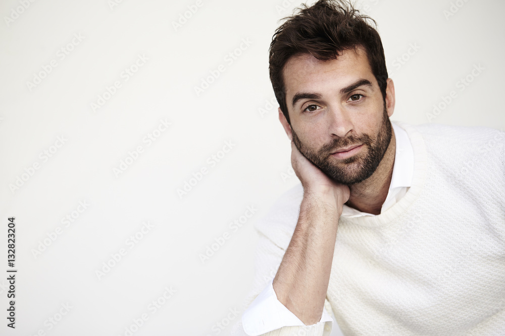 Handsome guy in white sweater, portrait Handsome guy in white sweater, portrait