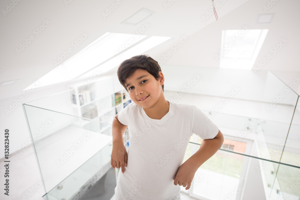Cute boy in new modern property home interior Cute boy in new modern property home interior