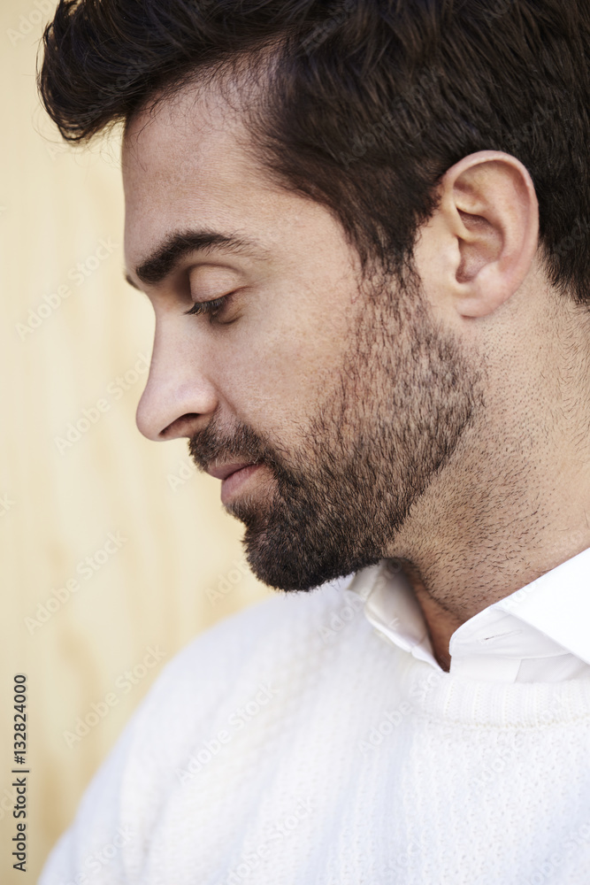 Fototapeta premium Stubble guy in profile, close up