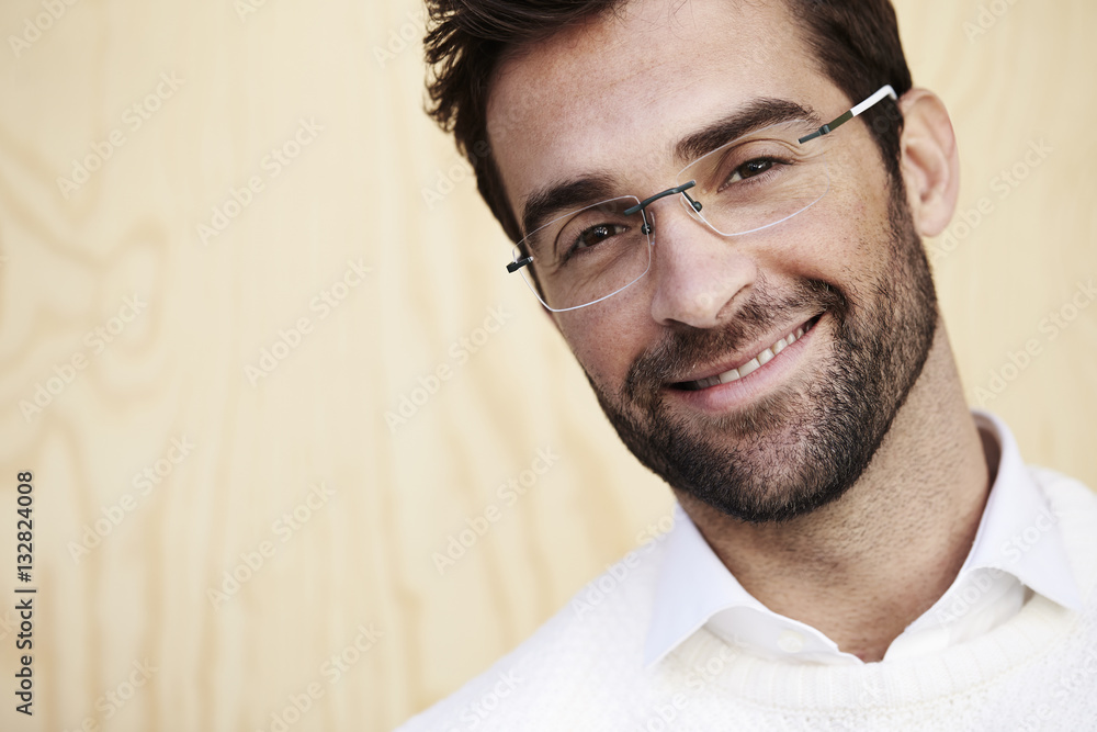 Smiling man in glasses, close up Smiling man in glasses, close up