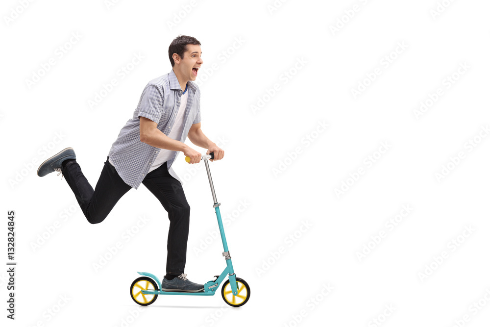 Overjoyed guy riding a scooter Overjoyed guy riding a scooter