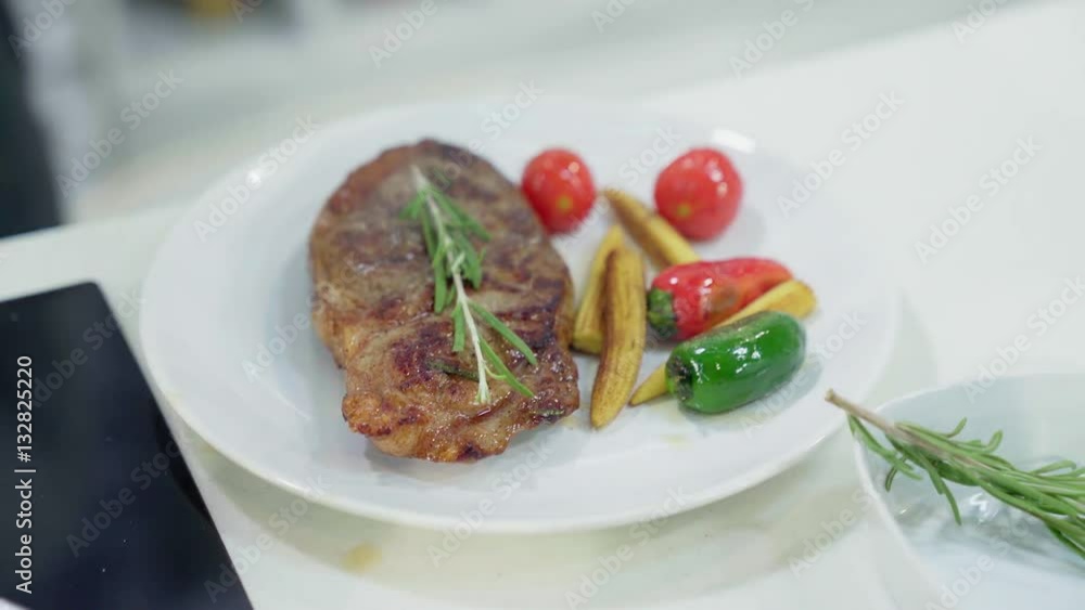 Cooking steak. Meat on the plate. Cooking steak. Meat on the plate.