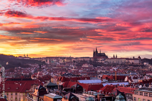 Old Town of Prague (Czech Republic) in sunset. Skyline with Old town and Castle (Hrad) of Prague in the background. Picture represents main landmarks of spectacular city.