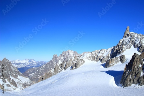 Winter landscape in Mont Blanc massif with Dente del Gigante peak