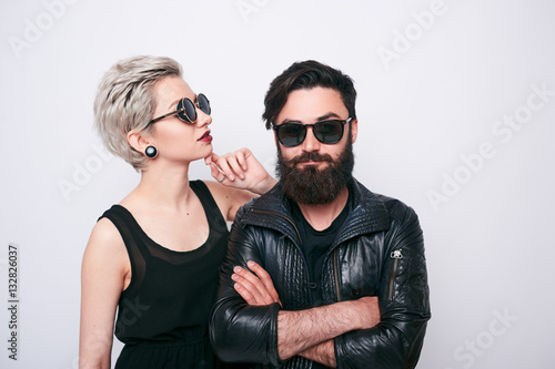 фотографія alternative couple in rock style clothes