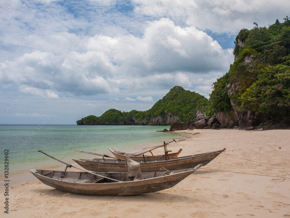Fishing boats parked on the beach during the day. (6) Fishing boats parked on the beach during the day. (6)
