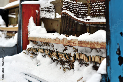 Wallpaper Mural Vintage Piano musical instrument under the snow. Torontodigital.ca