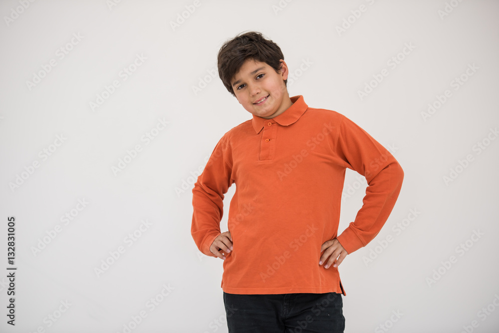 Cute school kid posing in studio with different facial expressio Cute school kid posing in studio with different facial expressio