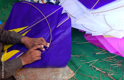 Making of traditional Indian kite for flying during Pongal or Sankranti Hindu festival,a Harvest Festival,during winter