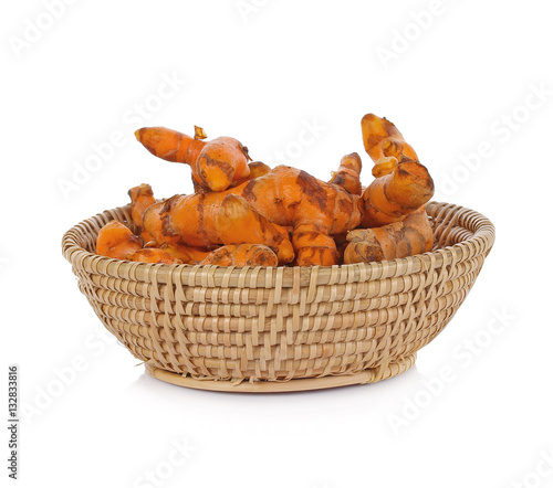 turmeric roots in bamboo basket