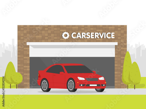 Automobile repair shop garage. The car on background of brick building. Urban space in the background