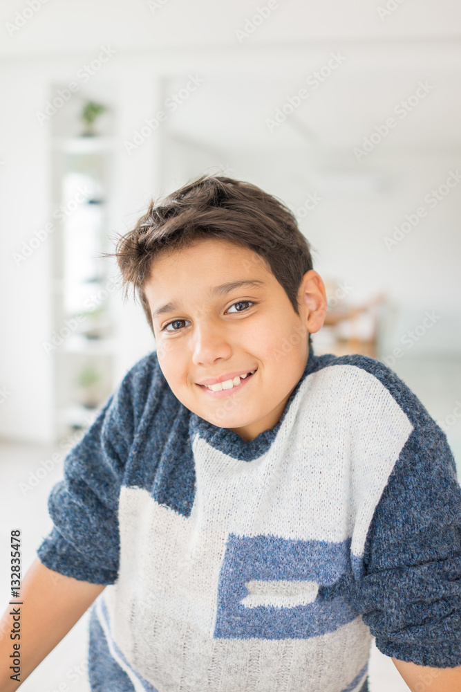 Cheerful kid at his room in new house Cheerful kid at his room in new house