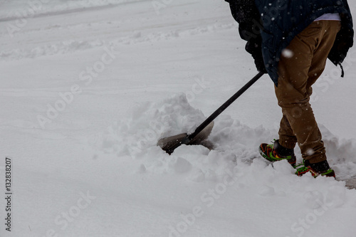Shoveling snow after a winter storm photo