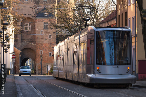 historic obertor and metro train in neuss germany photo