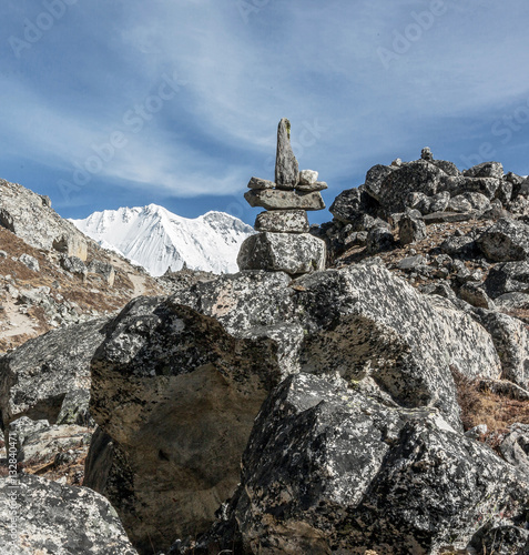 The sixth highest in the world peak the Cho Oyu (8153 m) and ritual pyramid - Gokyo region, Nepal, Himalayas photo