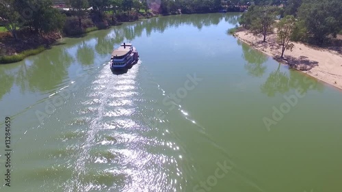 Aerial footage of classic historical vintage paddlesteamer (PS Melbourne) on Murray River
