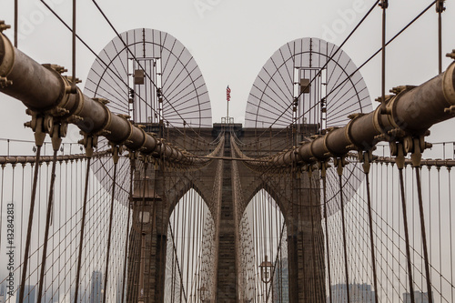 Views across the bridge walking the Brooklyn Bridge in New York