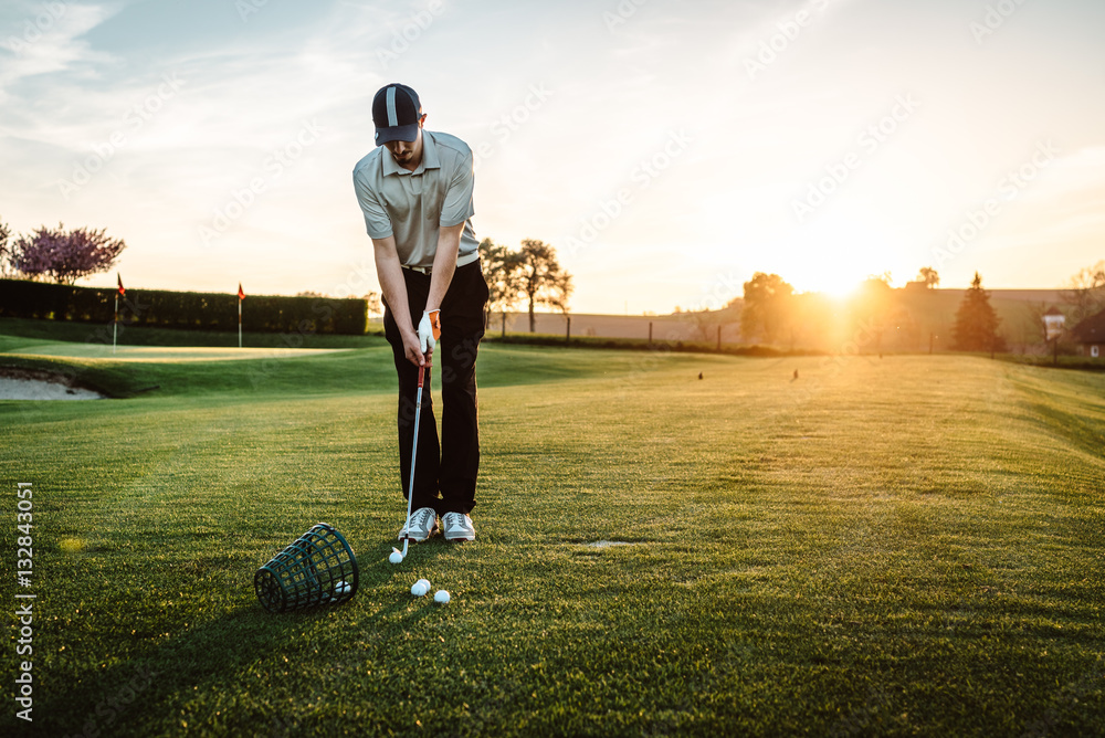 Young man playing golf