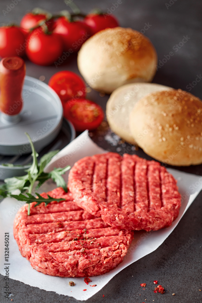 Raw Beef Hamburger Patties with Press and Rolls Raw Beef Hamburger Patties with Press and Rolls