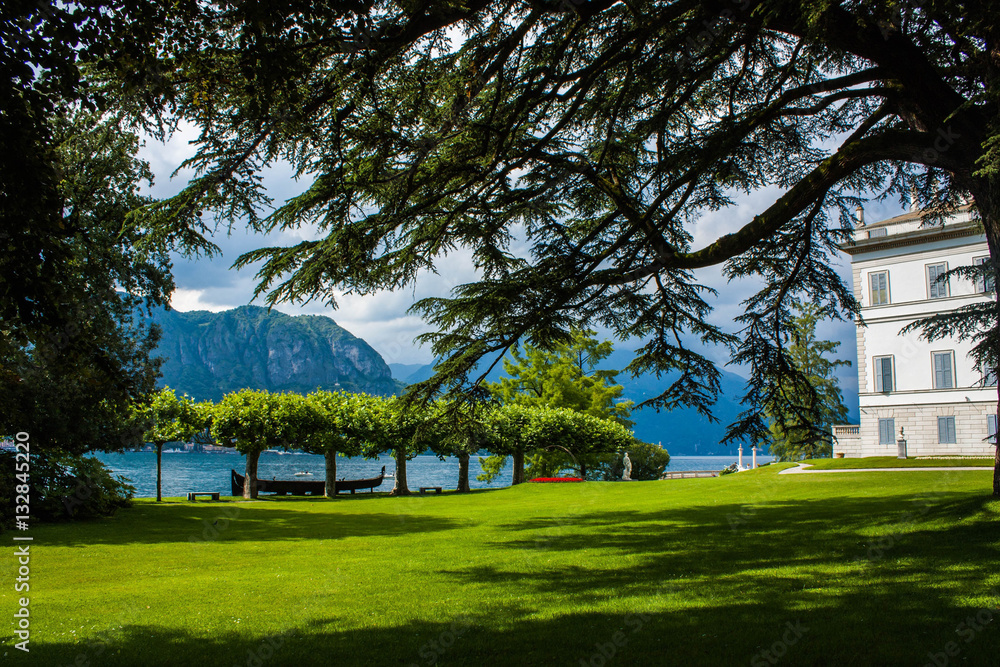 Bellagio city on Lake Como, Italy. Lombardy region. Italian famous landmark, Villa Melzi Park. Botanic Garden plants and trees.