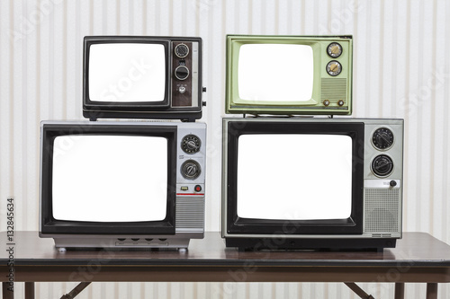 Four Vintage Televisions With Cut Out Screens