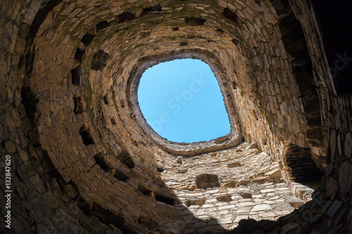 Nice view of the fortress Ananuri, standing on the shore of the reservoir Zhinvali. Georgia. Tower on the inside