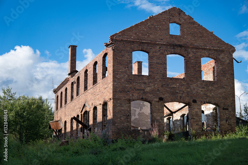 Old abandoned brick building in Norberg, Sweden photo