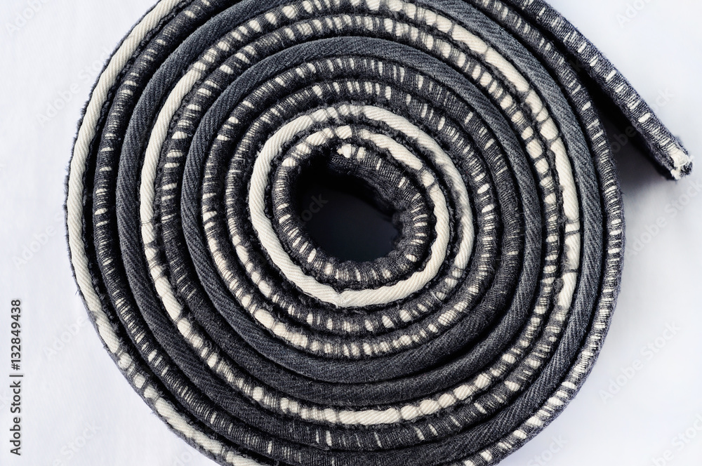 Naklejka premium worn black belt in martial arts