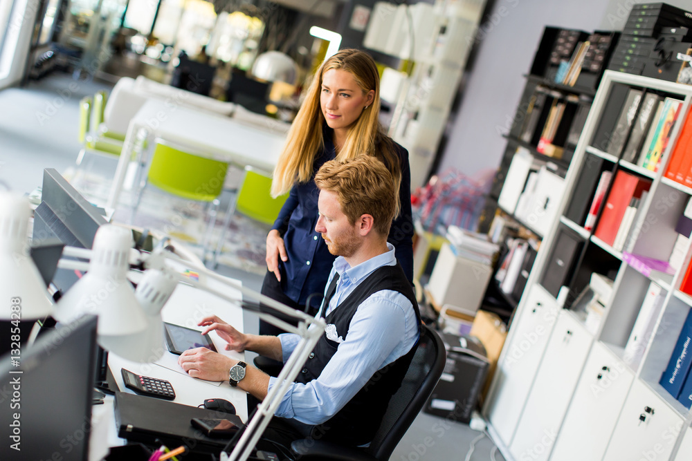 Fototapeta premium Business couple using laptop