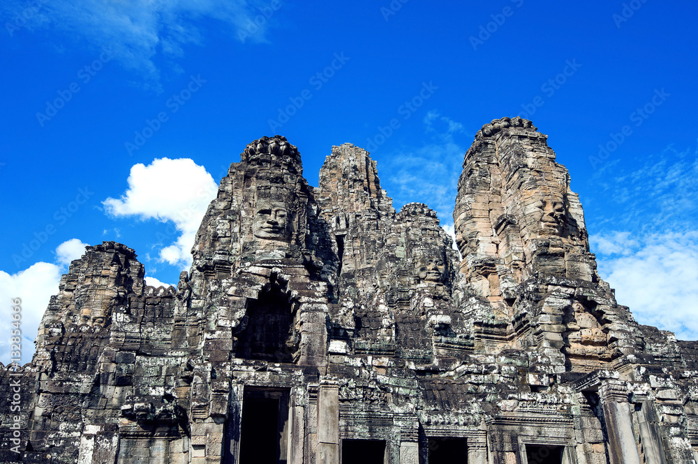 Bayon Temple with giant stone faces, Angkor Wat, Siem Reap, Camb Bayon Temple with giant stone faces, Angkor Wat, Siem Reap, Camb