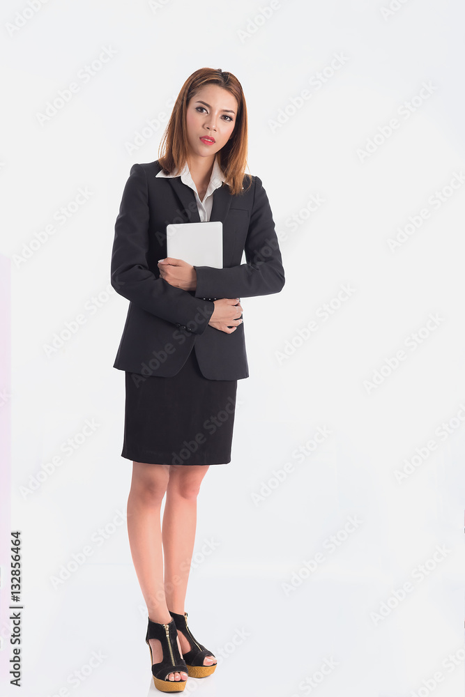 Business woman in black suit, isolated over white background. Sm Business woman in black suit, isolated over white background. Sm