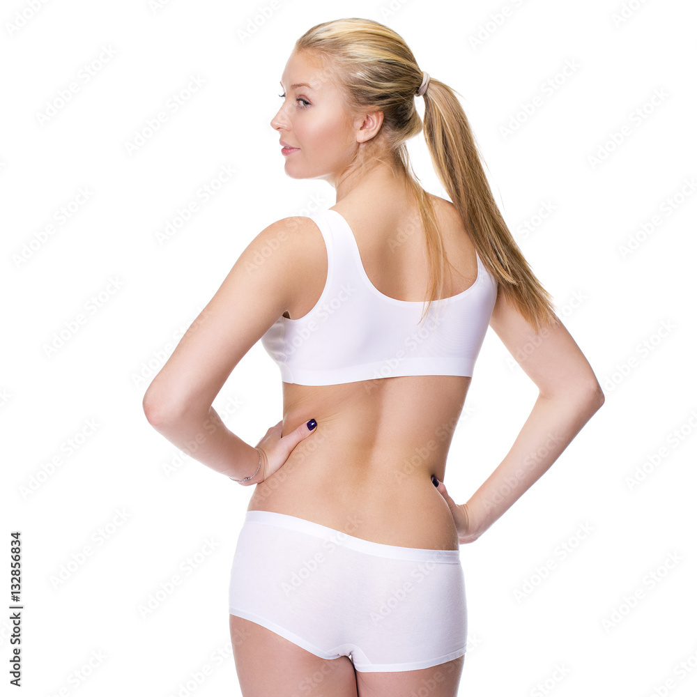 Blonde woman wearing lingerie, back view Blonde woman wearing lingerie, back view