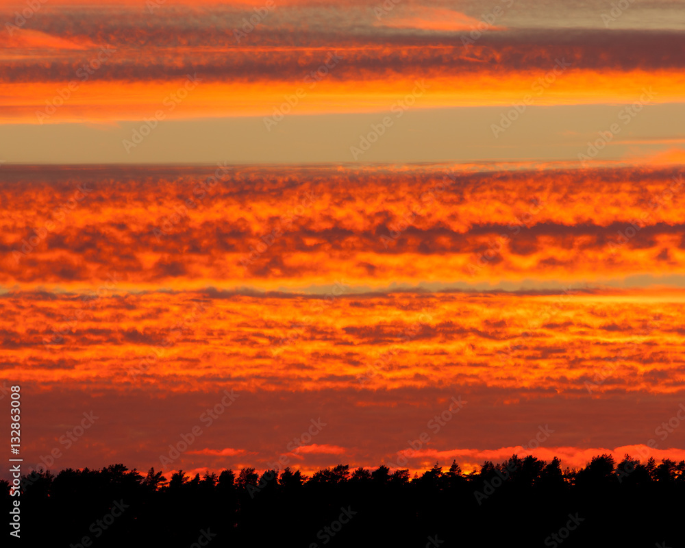 Fiery red sunset clouds