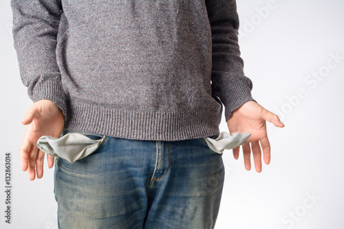 Man show empty pocket.
