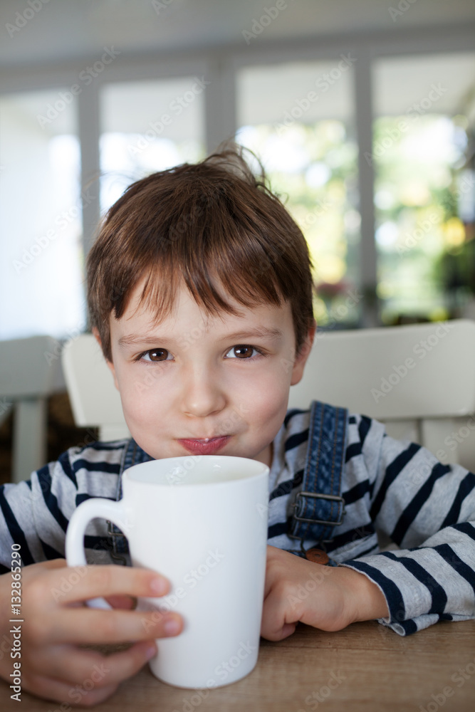 Adorable boy drinking Adorable boy drinking