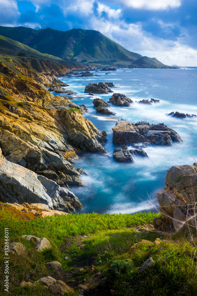 Big Sur California coast ocean meeting rocky cliff land travel destination vertical