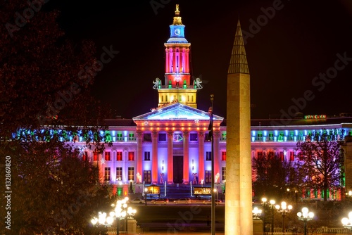 Night View of Denver City Hall and War Memorial - colorful holiday lights lit up Denver City and County Building and War Memorial at Civic Center in Downtown Denver, Colorado, USA.