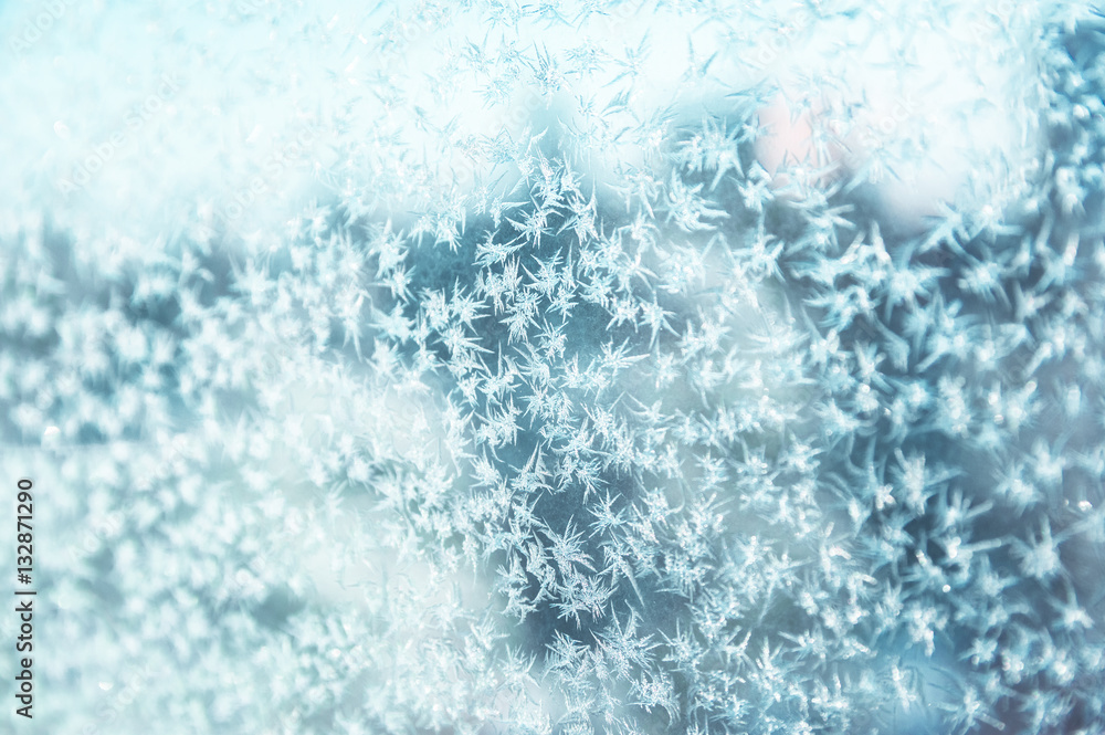 Fototapeta premium Frost pattern on a window. Background photo