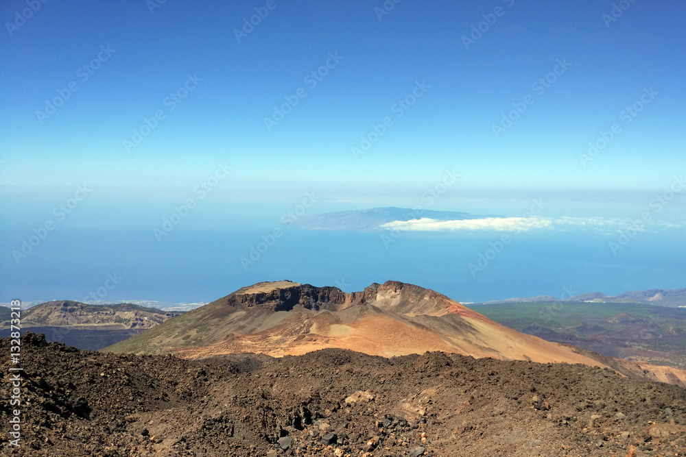A view of a distant island above volcano crater, Teide, Tenerife, Canary Islands