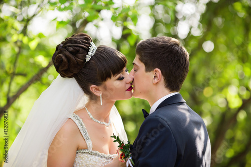 Wedding kiss, young asian bride and groom kissing on wedding ceremony. Wedding love concept